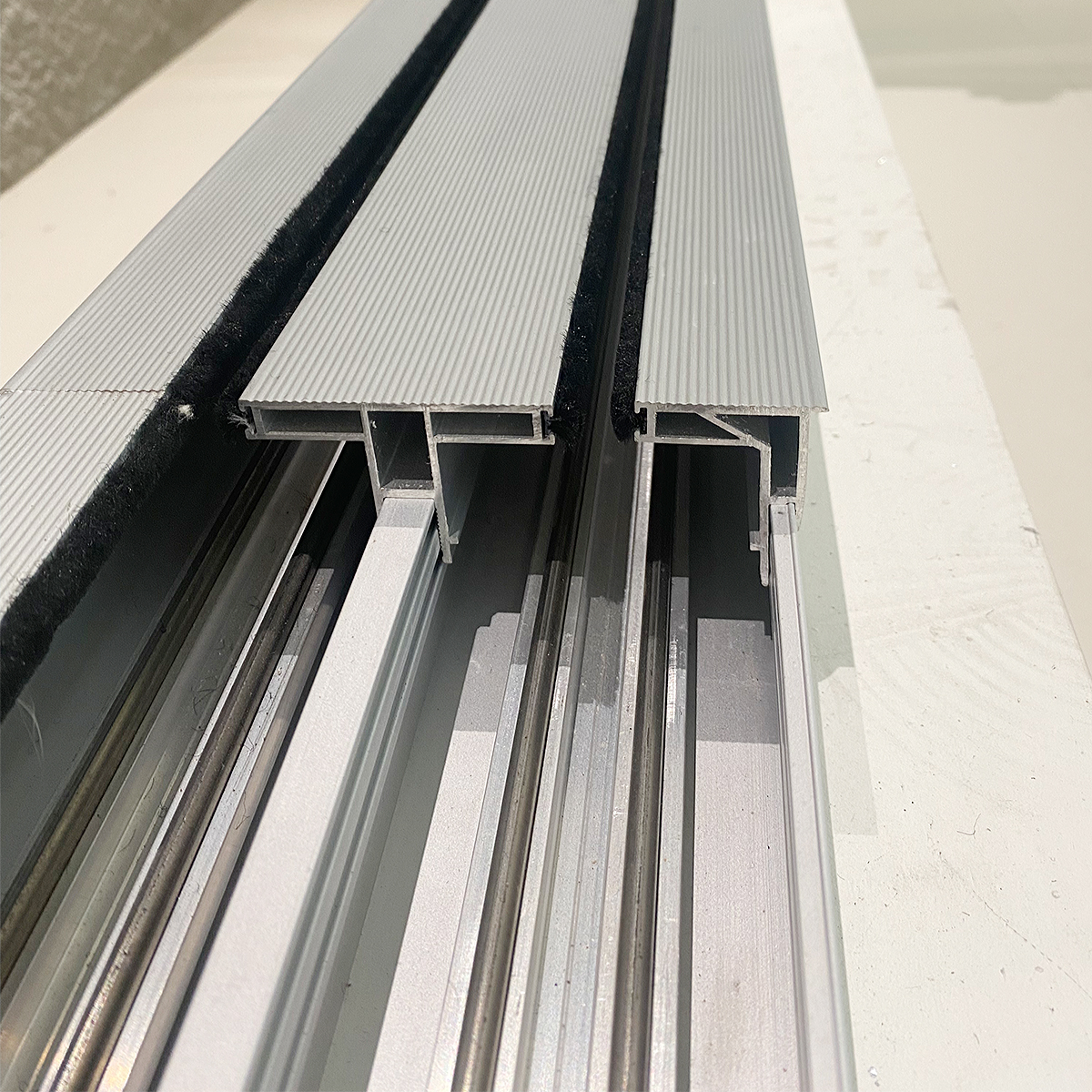 Large-span glass doors track